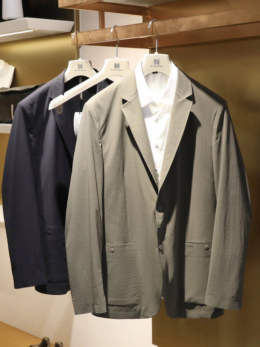 Spring and summer new men's light business leisure high-end urban outdoor breathable three-proof pressure rubber suit